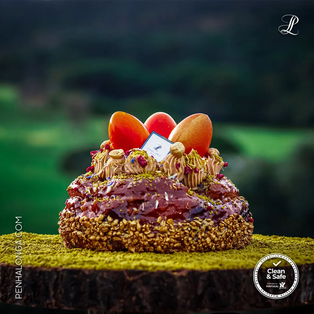 Penha Longa Resort — social post of a decorated dessert with chocolate eggs on a mossy stump