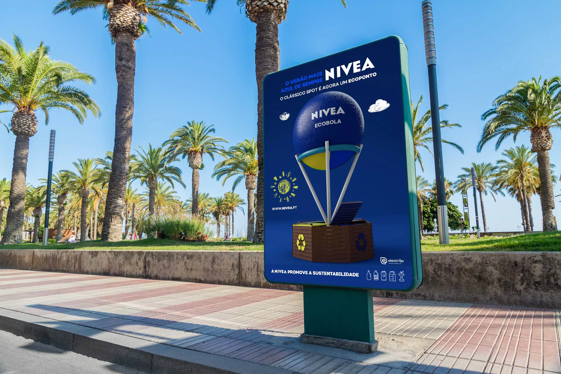 EcoBola — Nivea street billboard with a blue balloon-shaped recycling point among palm trees