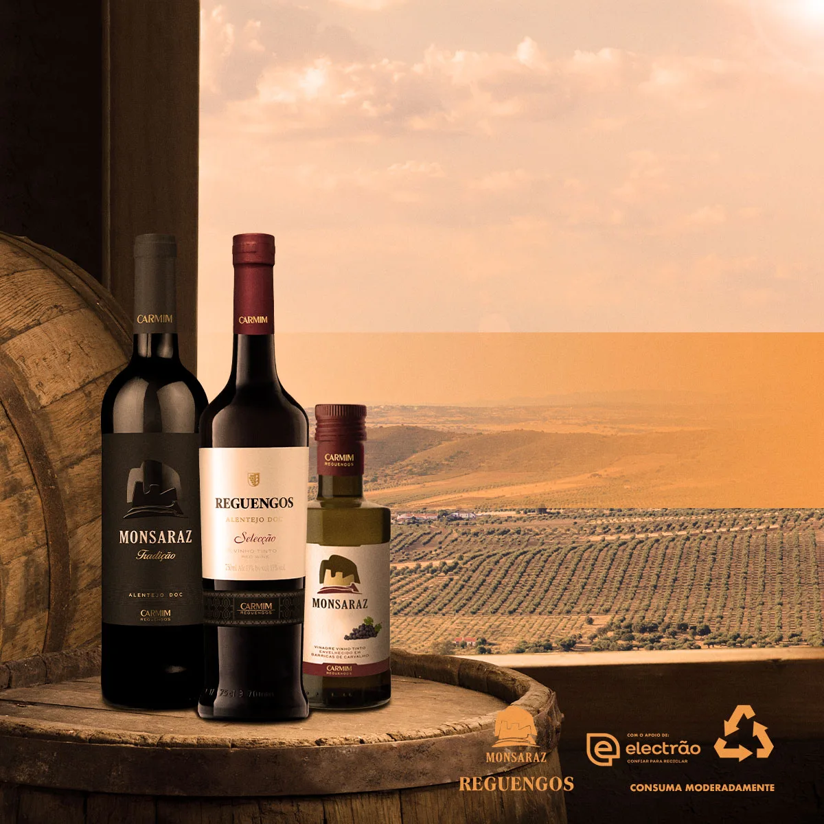 Carmim — social post of Monsaraz and Reguengos wine bottles on a barrel with vineyard backdrop