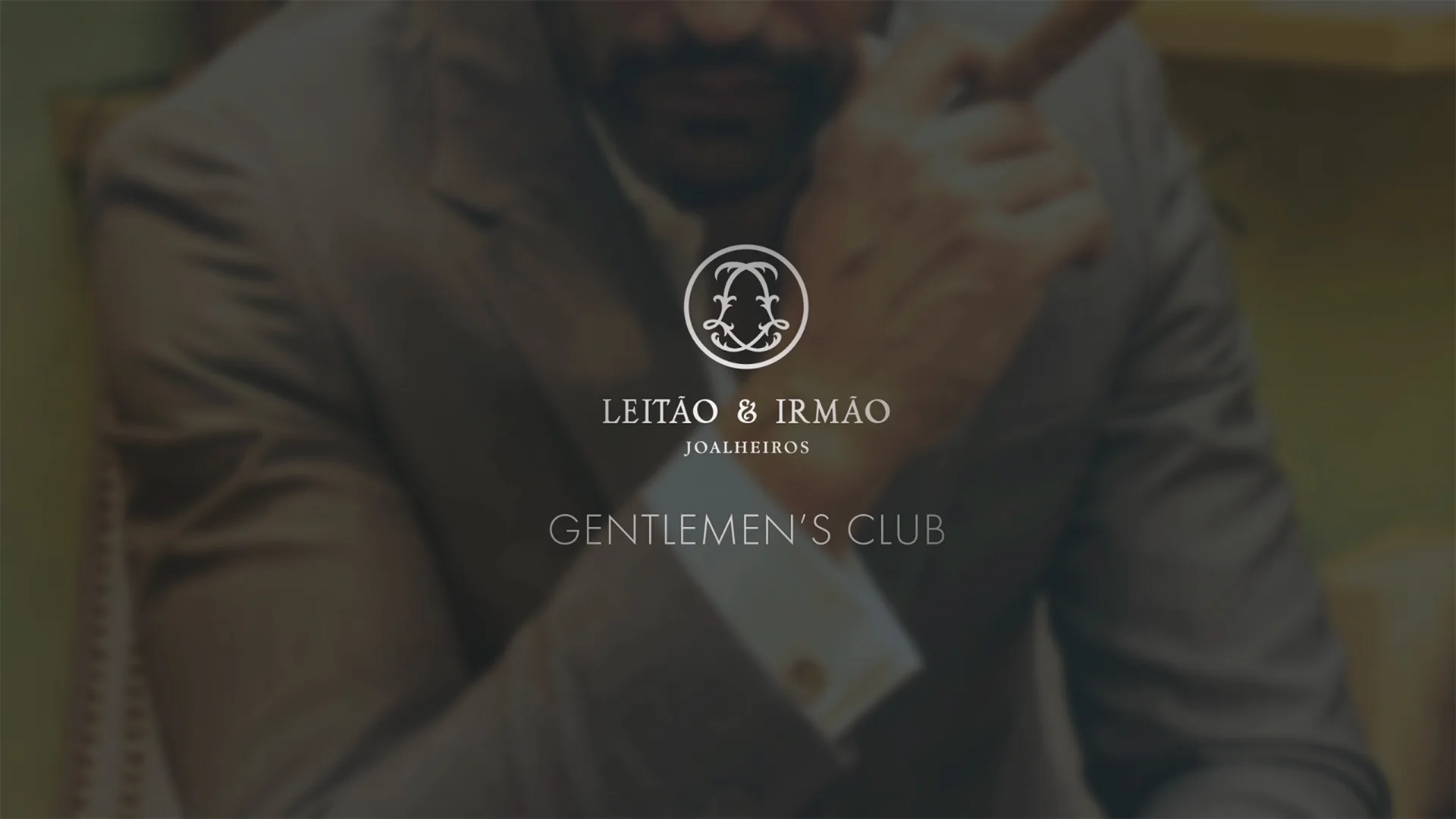 Gentleman’s Club — video still of Leitão & Irmão Gentlemen's Club logo over a man in a suit