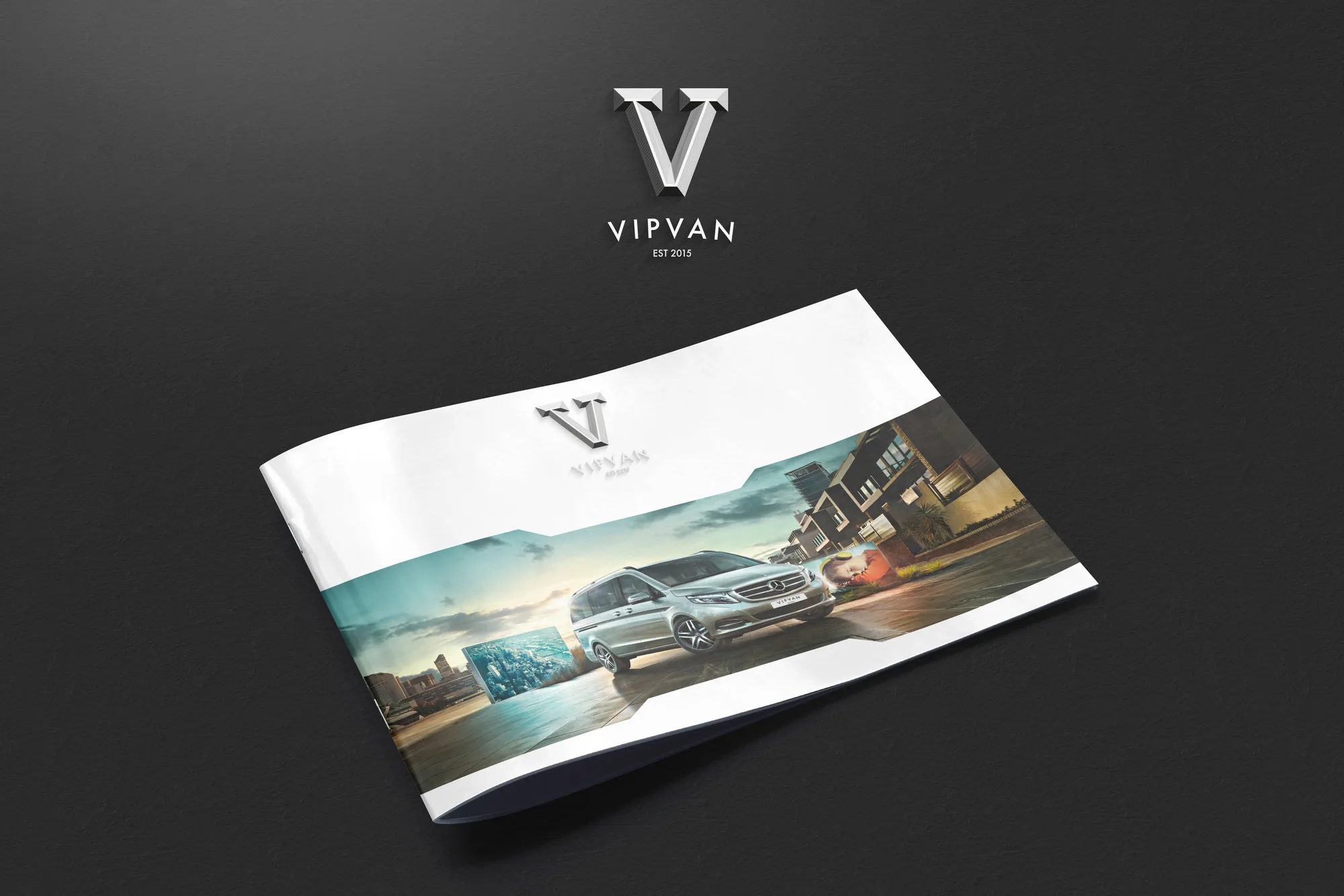 VipVan: landscape brochure cover with a silver Mercedes van on a coastal road, under the chrome V logo, est. 2015