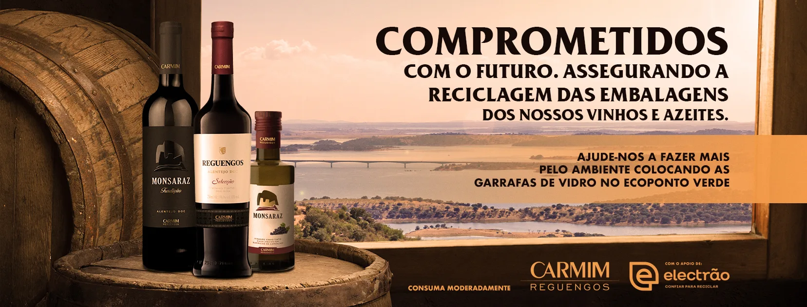Carmim — banner with wine bottles on a barrel and 'Comprometidos com o futuro' headline