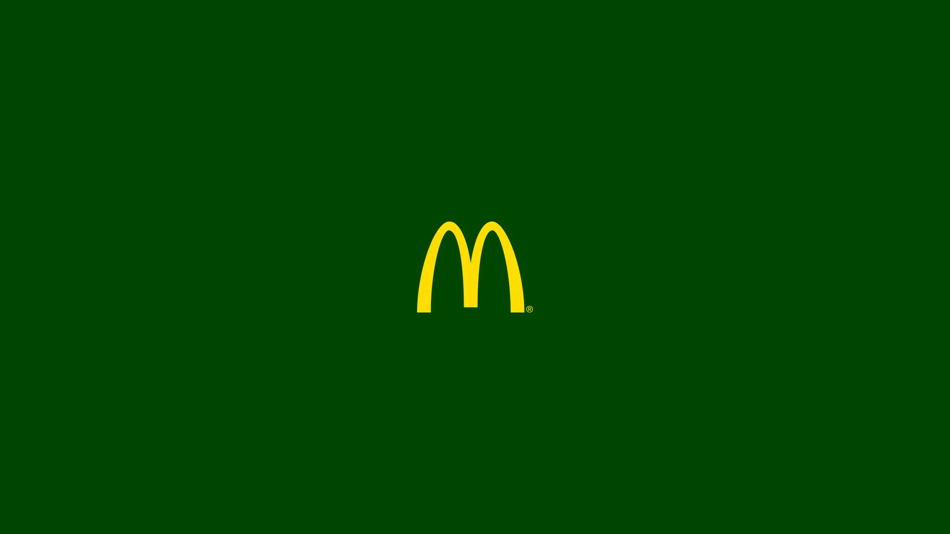 McToys — McDonald's golden arches logo on a dark green background