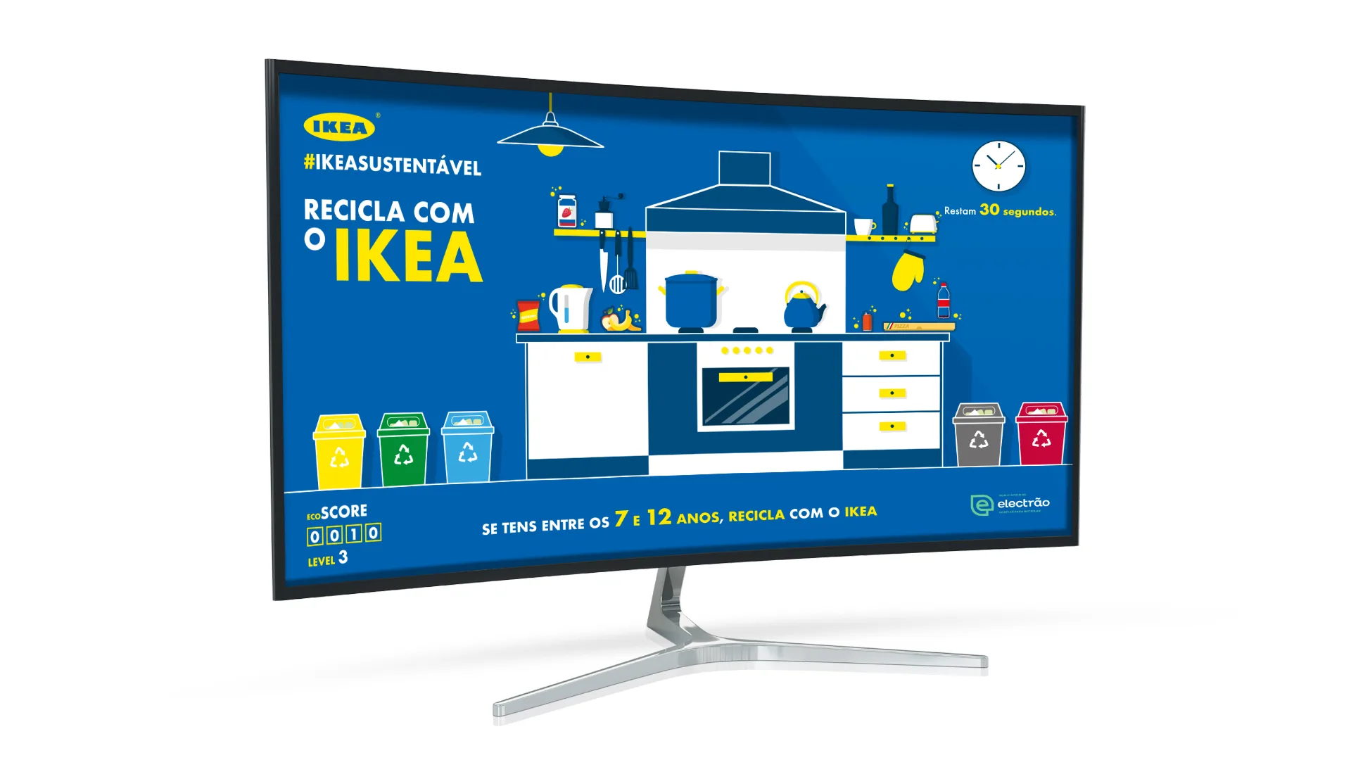 IKEA — recycling game screen "Recicla com o IKEA" with a kitchen scene and coloured bins, shown on a monitor