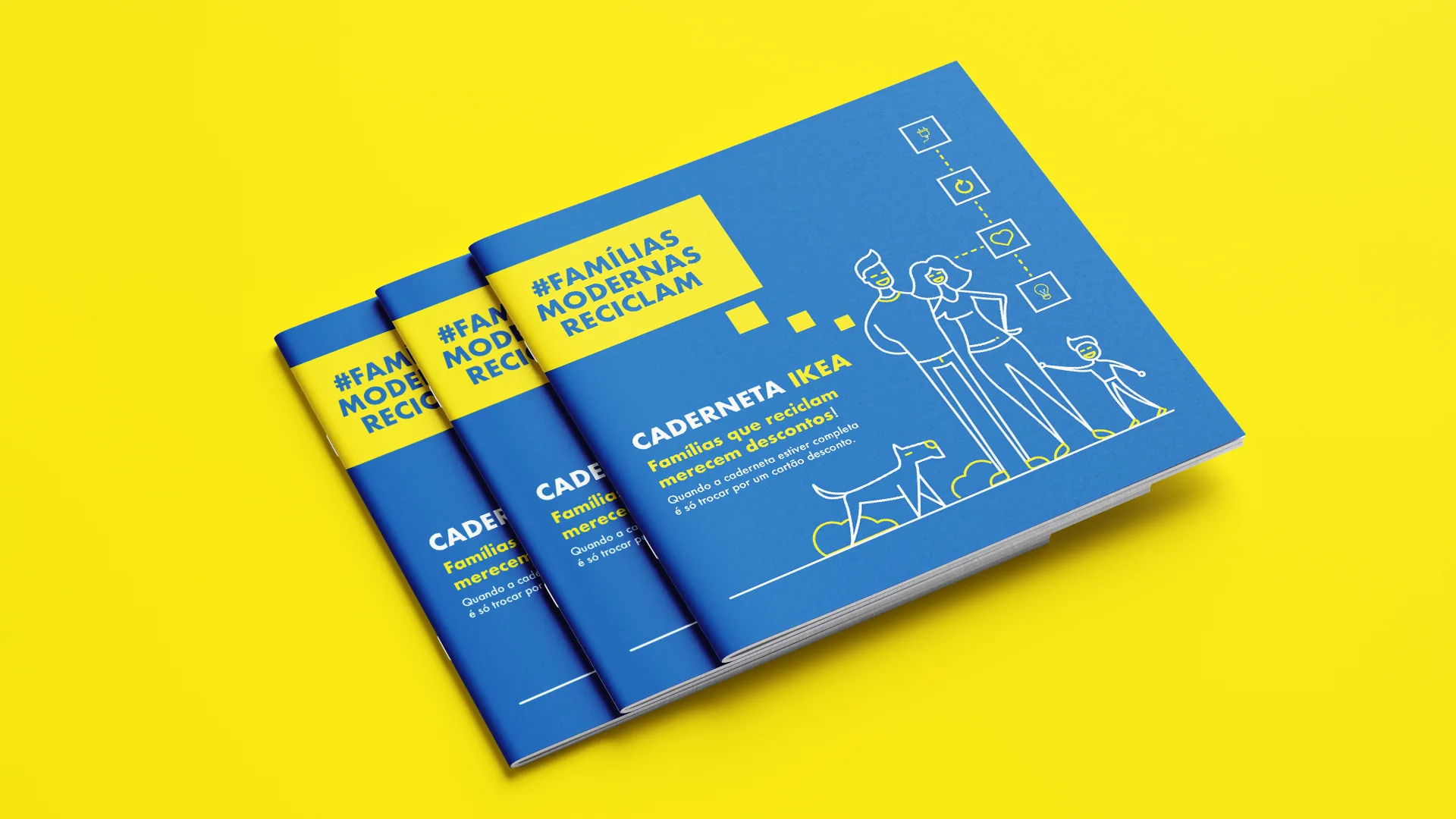 Famílias Modernas Reciclam — stacked IKEA "Caderneta" booklets with line-drawn family illustration on yellow