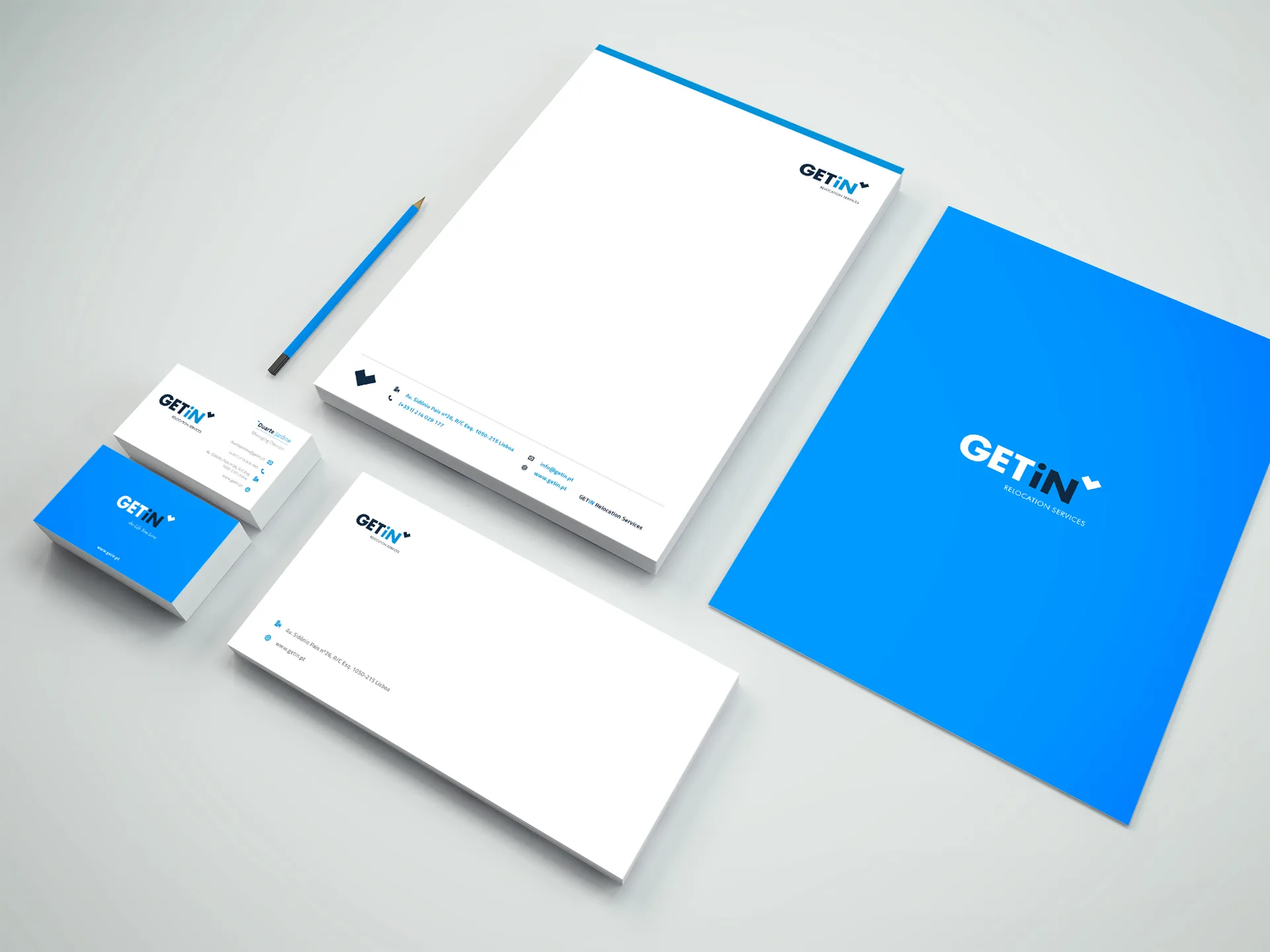 GETiN — blue and white stationery set with letterhead, envelope, folder and business cards