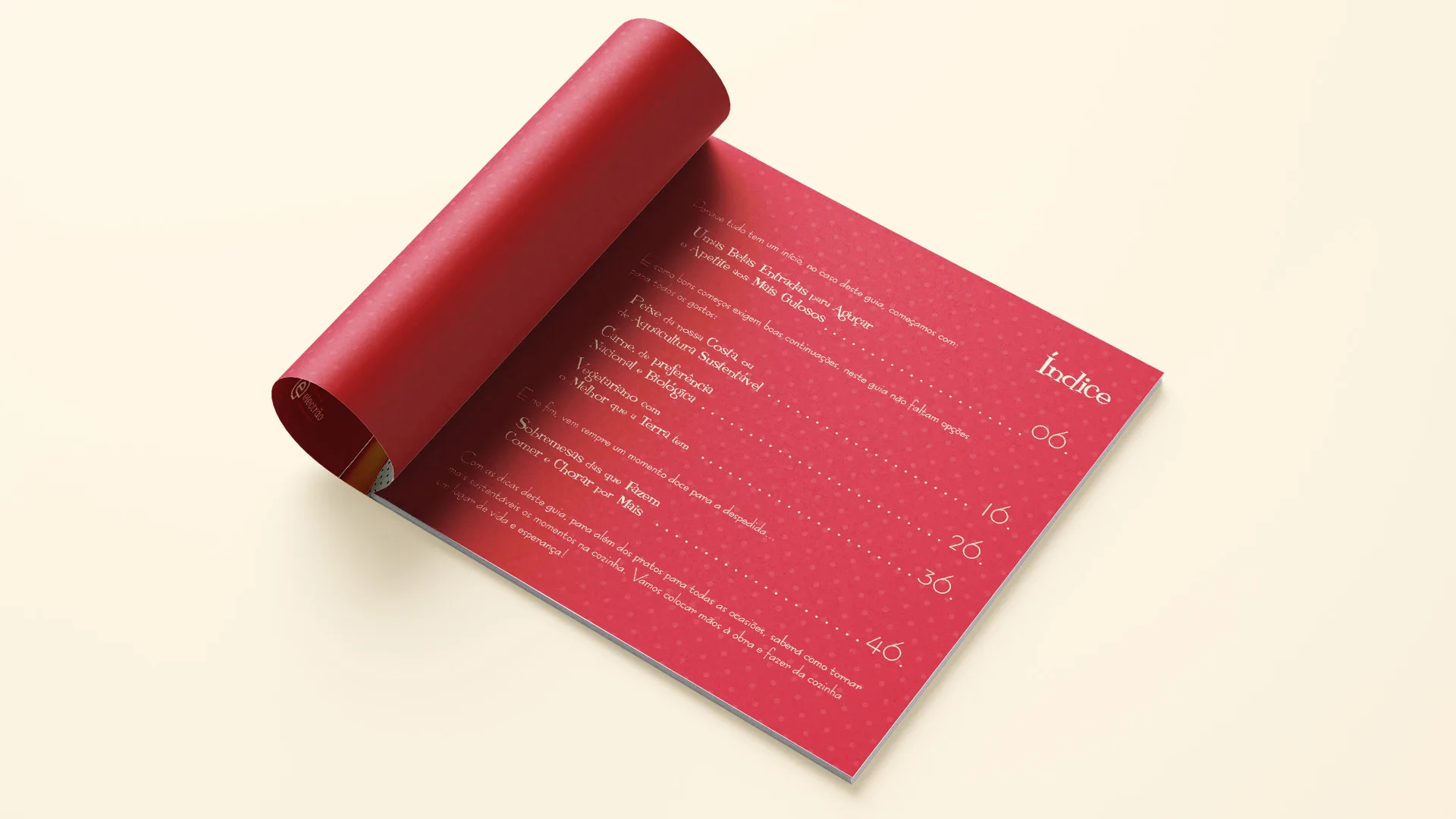 Um Guia Sustentável na Cozinha — red booklet rolled open to the index page
