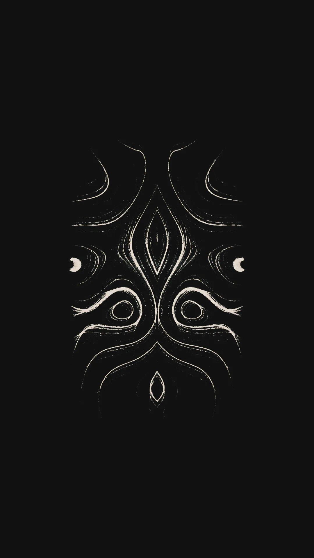 ohenema — small symmetrical mask-like pattern of fine white swirling lines on dark grey