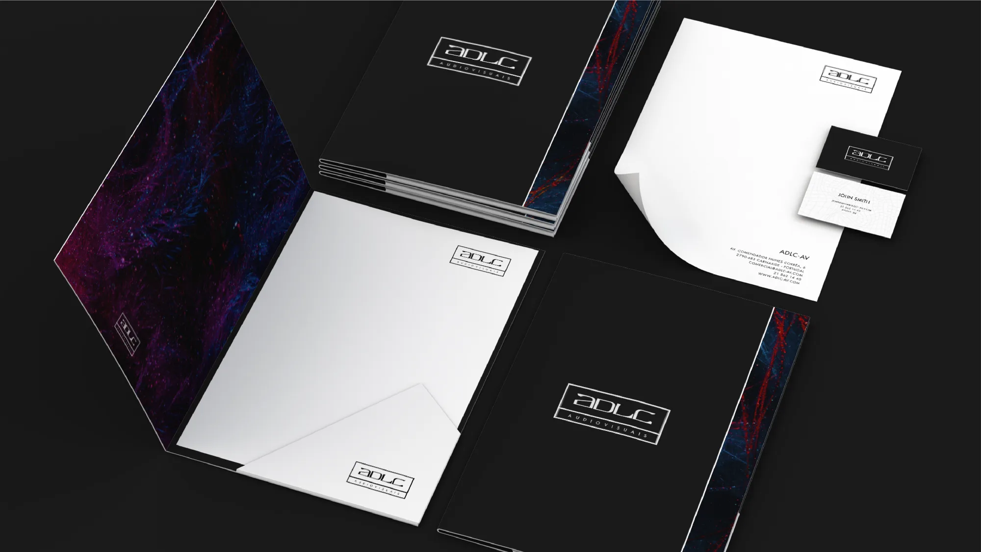 ADLC – Audiovisuais — black and white stationery set with folders, letterhead and business cards