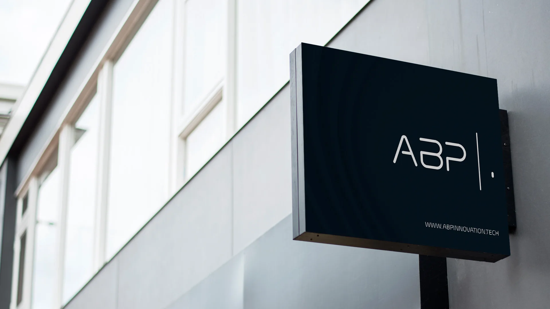 ABP — dark wall-mounted ABP sign on a building exterior