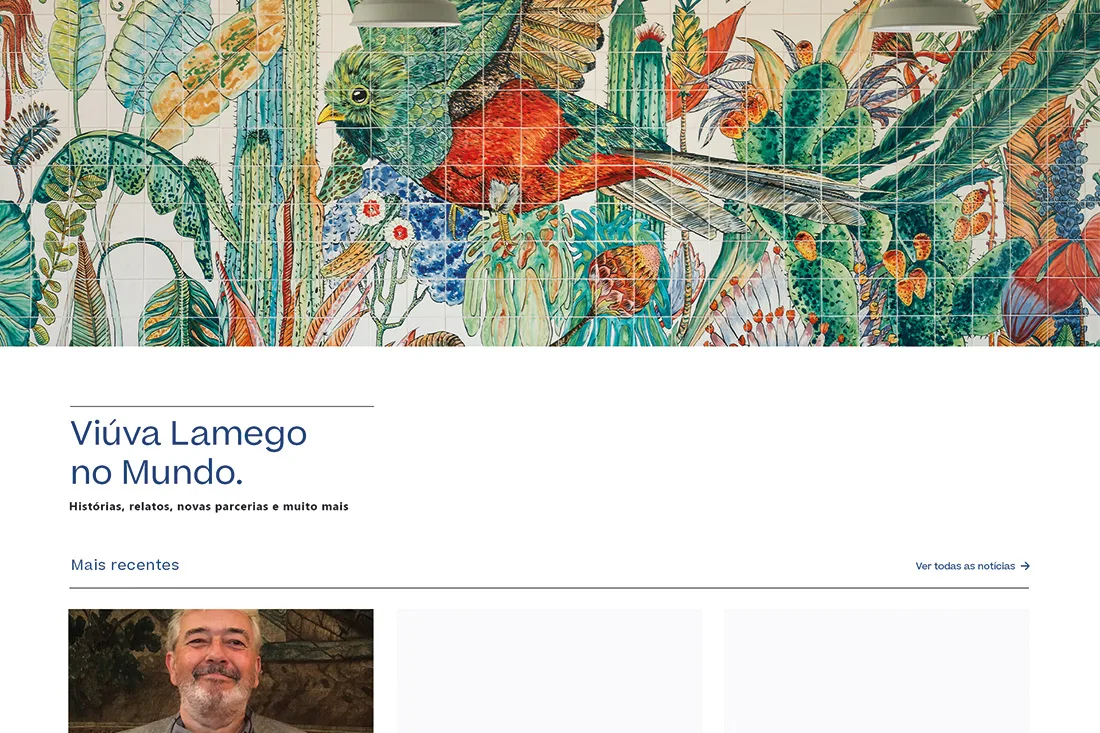 Viúva Lamego website — Viúva Lamego no Mundo news section under a colourful azulejo panel with a bird