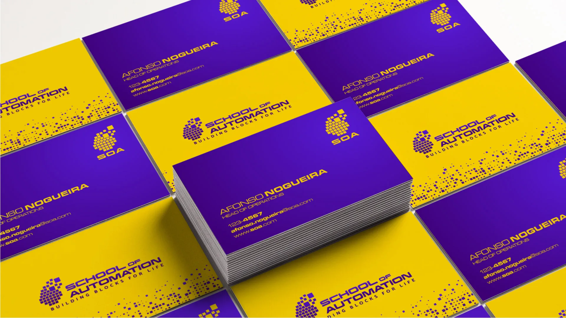 SOA – School of Automation — purple and yellow business cards spread in a grid
