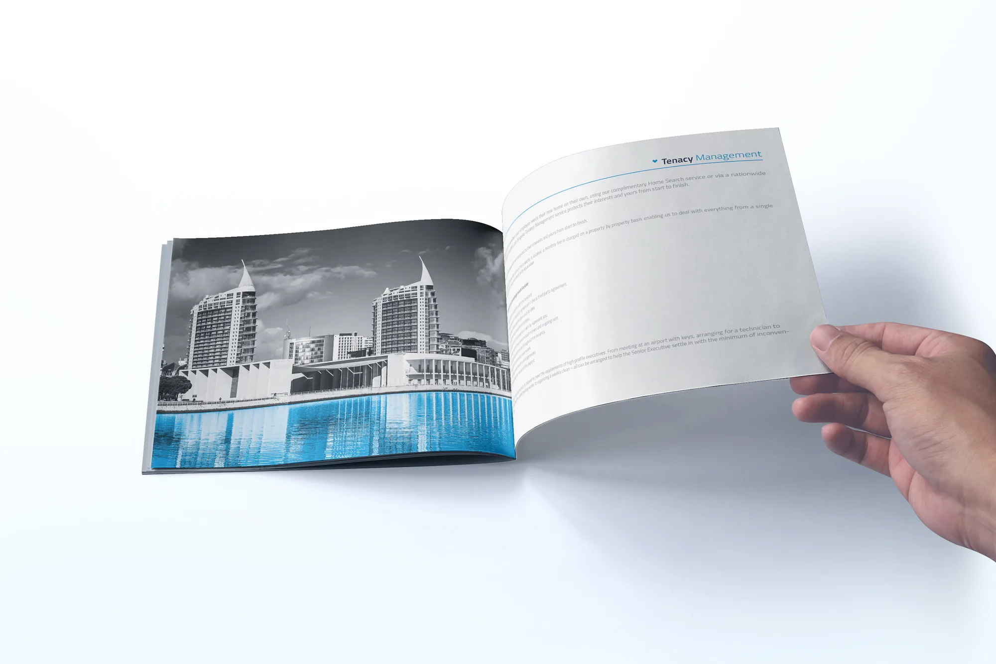 GETiN — hand turning a brochure page with a black-and-white city photo and Tenant Management text