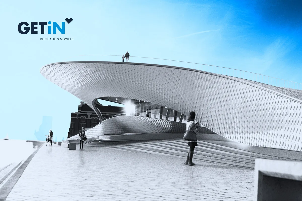 GETiN — logo with Relocation Services tagline over a photo of a wave-shaped white building