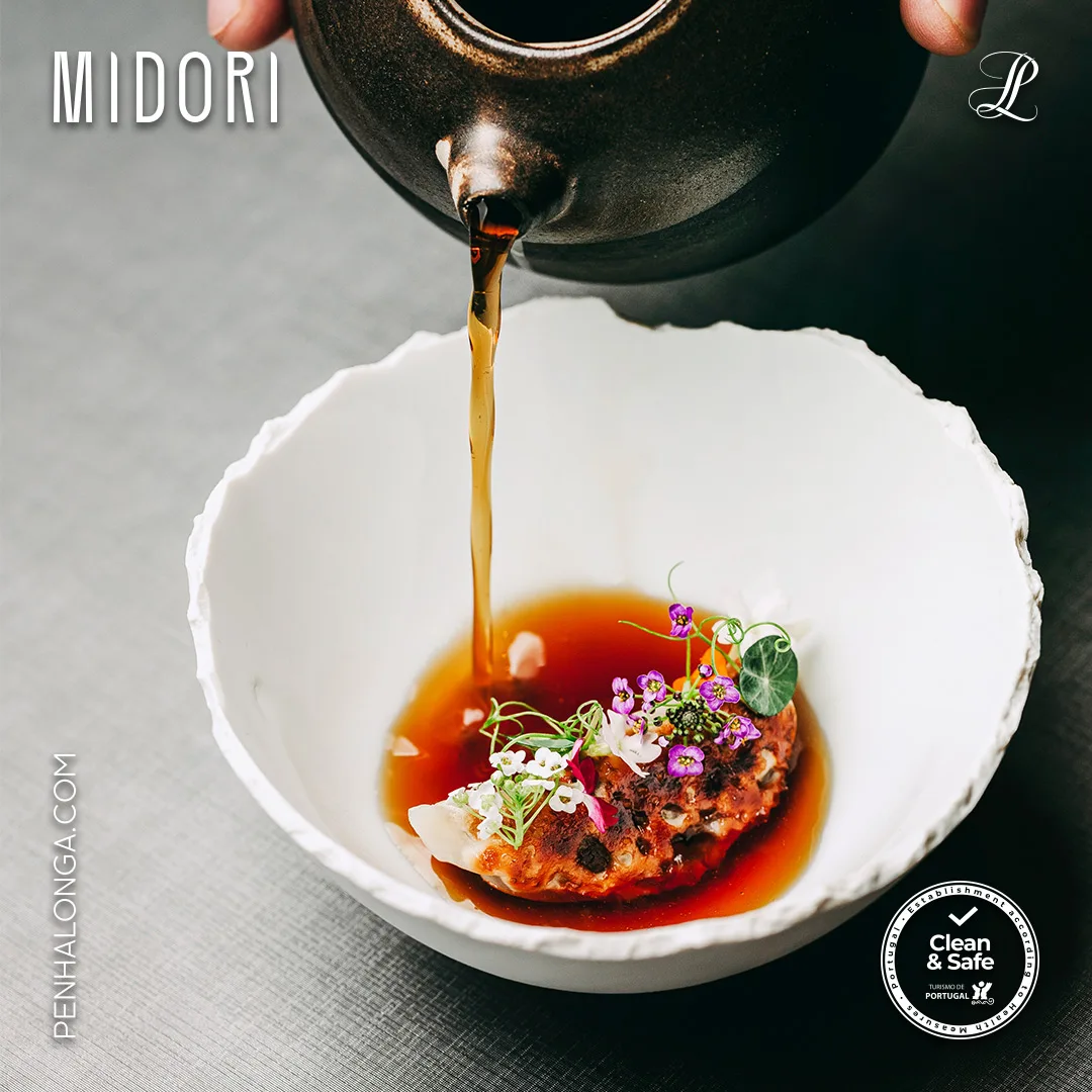 Penha Longa Resort — MIDORI restaurant social post of broth poured into a white bowl