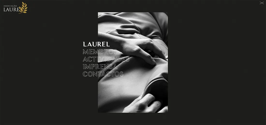 Laurel website — open navigation menu over a black-and-white photo of draped fabric