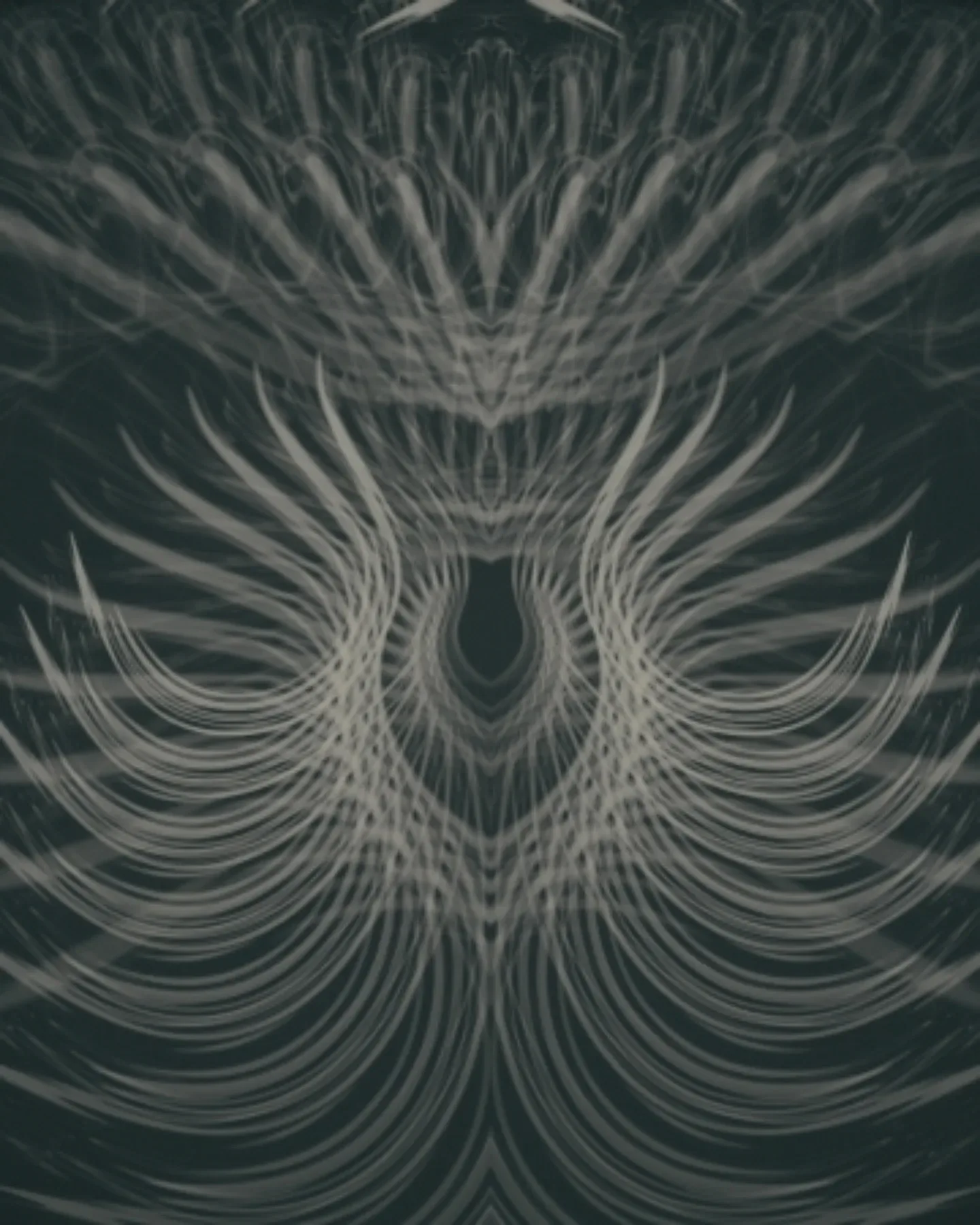 attar — symmetrical pale feather-like strands fanning out on a dark green background